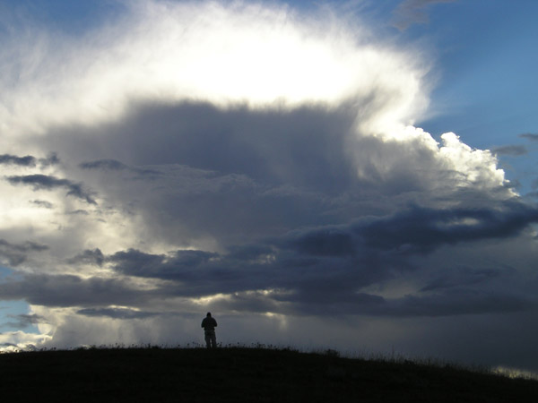 26 Clouds Figure on a hill Pitseng valley