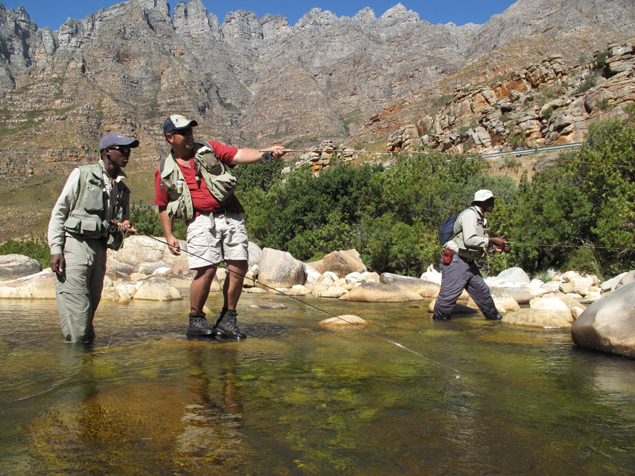 3. A guide guiding guides. One of the Capes best guides Mark Krige sights fish for John Thoaba